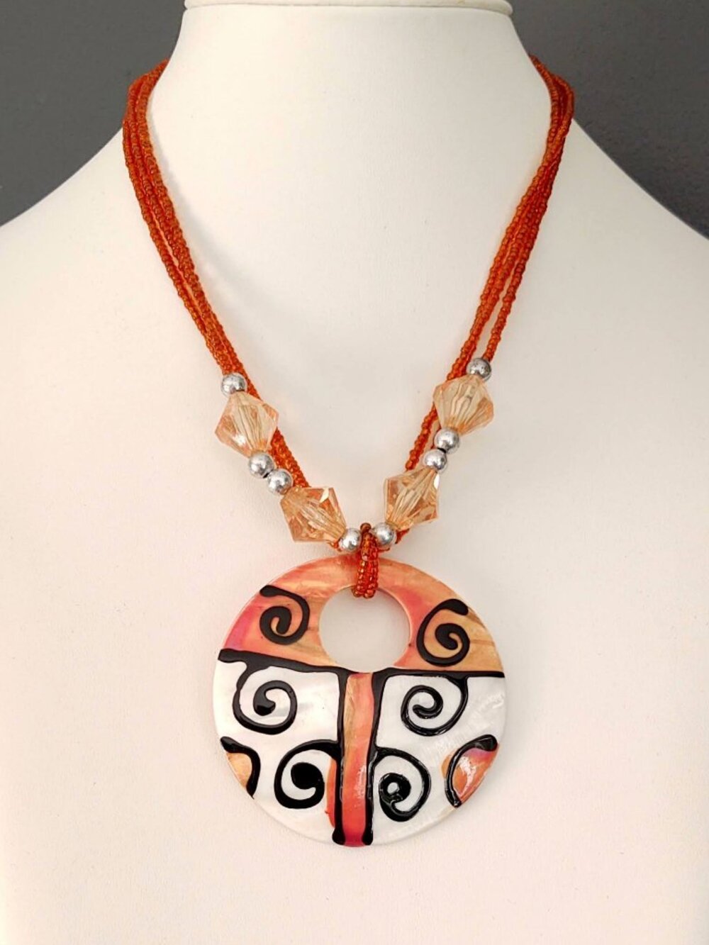 Shell pendant necklace with seed bead strands